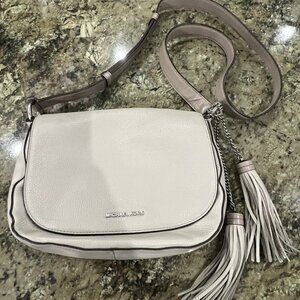 Michael Kors purse with chunky tassels. Bone colored leather.